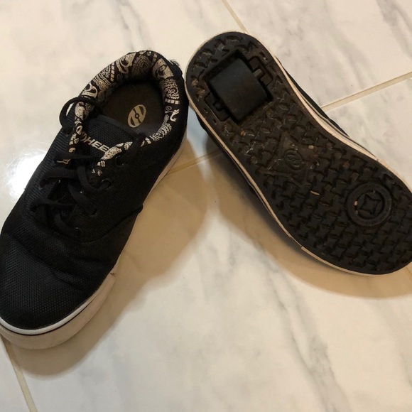 Heelys Other - Heeleys! Black lace up With wheels. So Fun!!